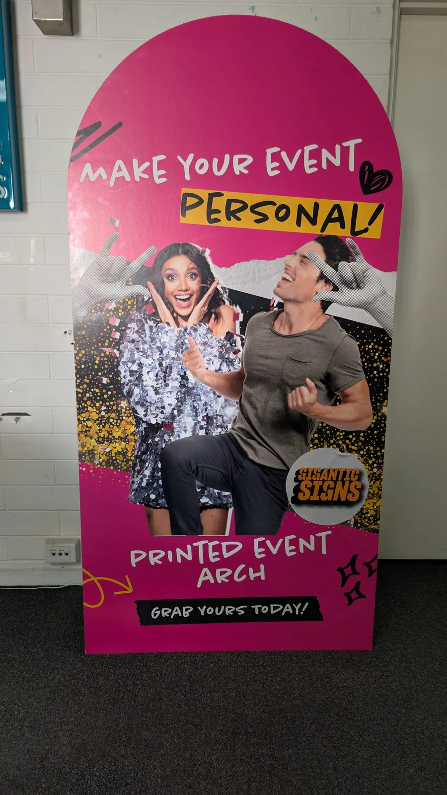 Printed event arch installed at an outdoor event