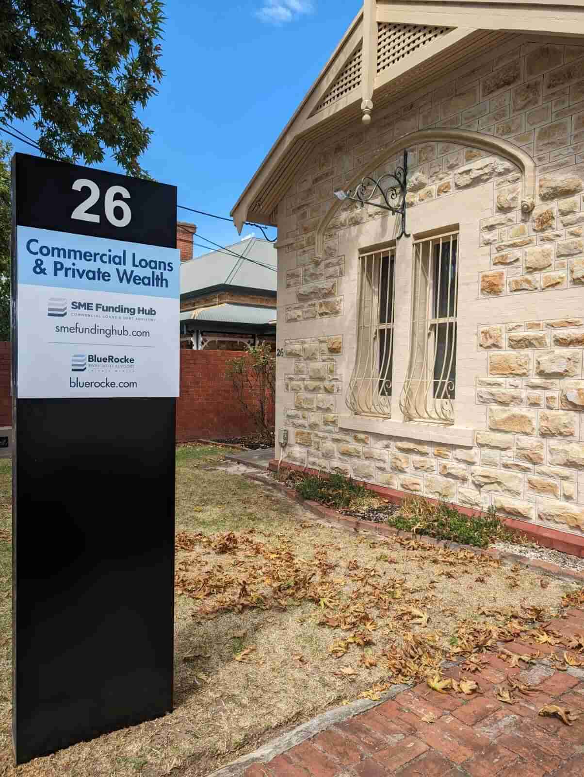 Freestanding pylon sign beside an Adelaide roadway